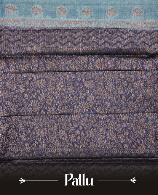 Aqua Blue Colour Tussar silk saree featuring Antique Zari motifs on body, Finished with contrast Blue colour Zigzag zari pattern border, paired with matching blouse piece.