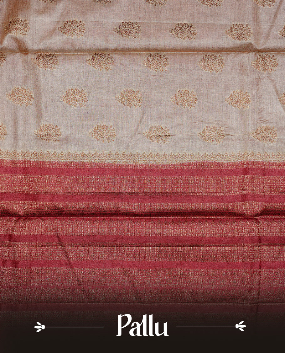 Golden Cream Colour Banaras tussar silk saree featuring Antique zari Motifs on body, Complemented by Maroon colour variant with zari border, paired with matching blouse Piece.