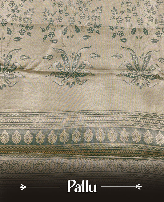 Light green colour Tissue silk saree featuring Gold & silver colour floral zari motifs on body, complemented by contrast Light green with gold zari border, paired with matching blouse piece.