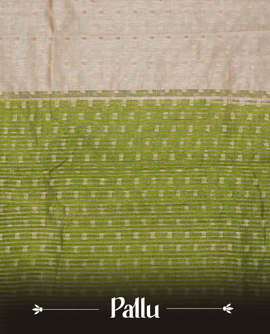 Cream colour Semi Tussar silk saree featuring an Gold zari motifs on body, accentuated by a contrast Green border adorned with intricate gold zari work, paired with a matching blouse piece.