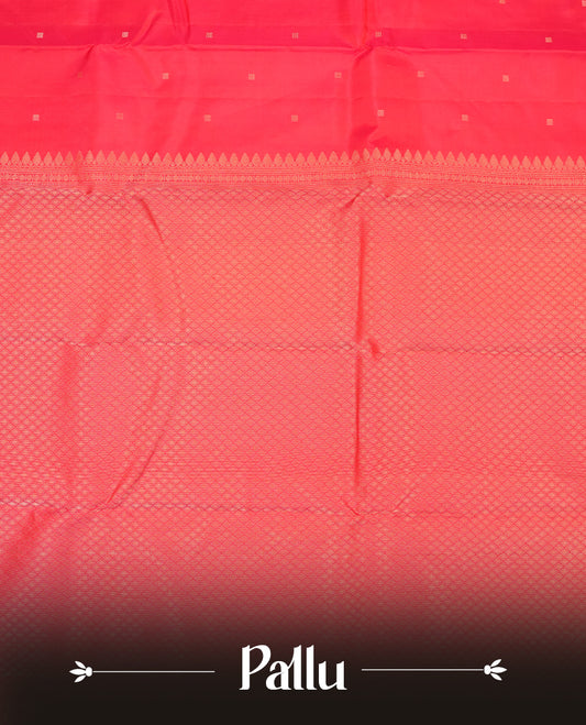 Rani pink colour Vasundhara silk saree adorned with all-over gold square motifs on the body, complemented by a self colour with box pattern on border and paired with a matching blouse piece.