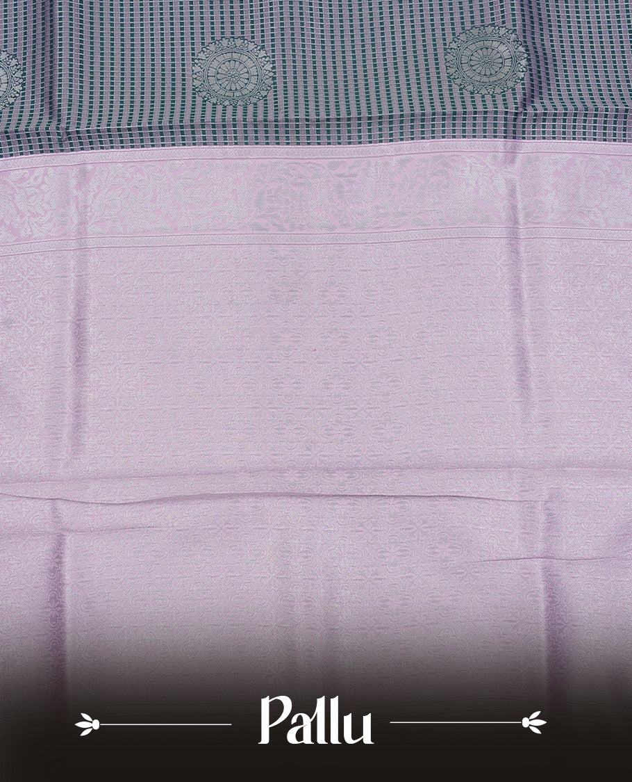 Green & Pink colour semi silk saree featuring Silver zari Small check pattern & motifs on body, complemented by contrast Pink colour with silver zari border, comes with matching blouse piece.