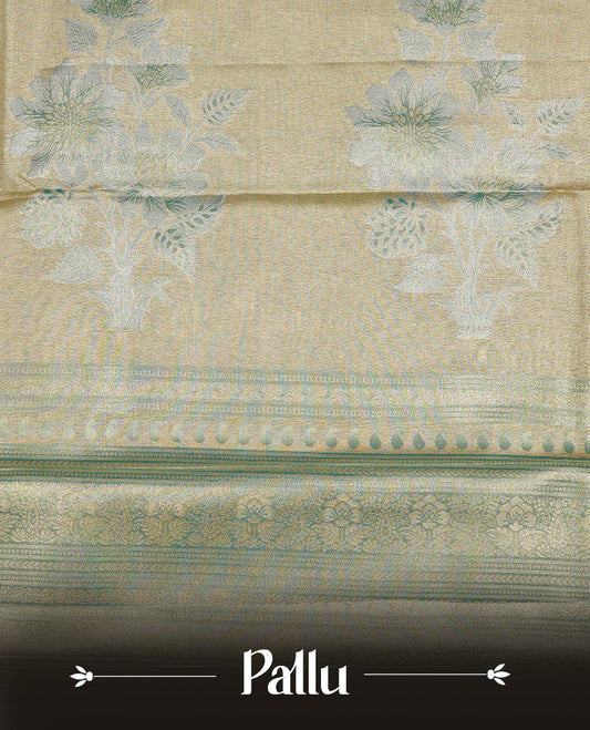 Light Green colour Tissue saree featuirng Green, Gold, silver zari Scales design on body, complemented by traditional border on self colour, paired with matching blouse piece.