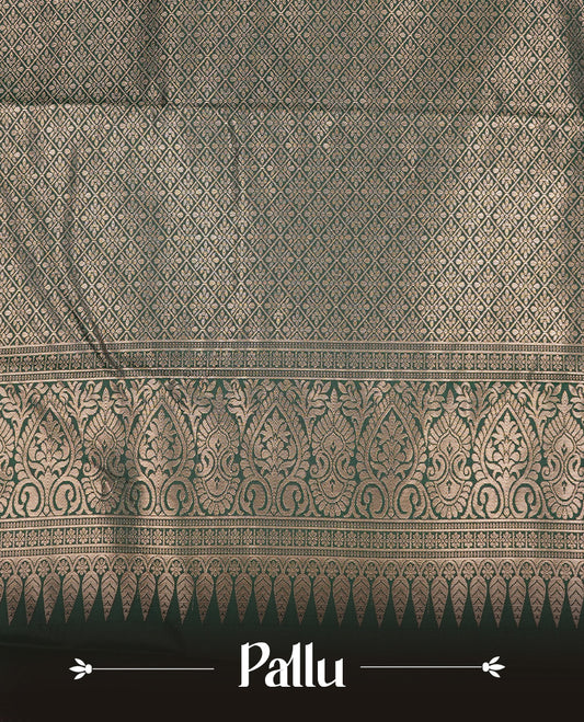 Green Semi Wedding Silk Saree featuring Gold Zari Motifs On body, Complemented with traditional zari with Self colour border, paired with matching blouse piece.