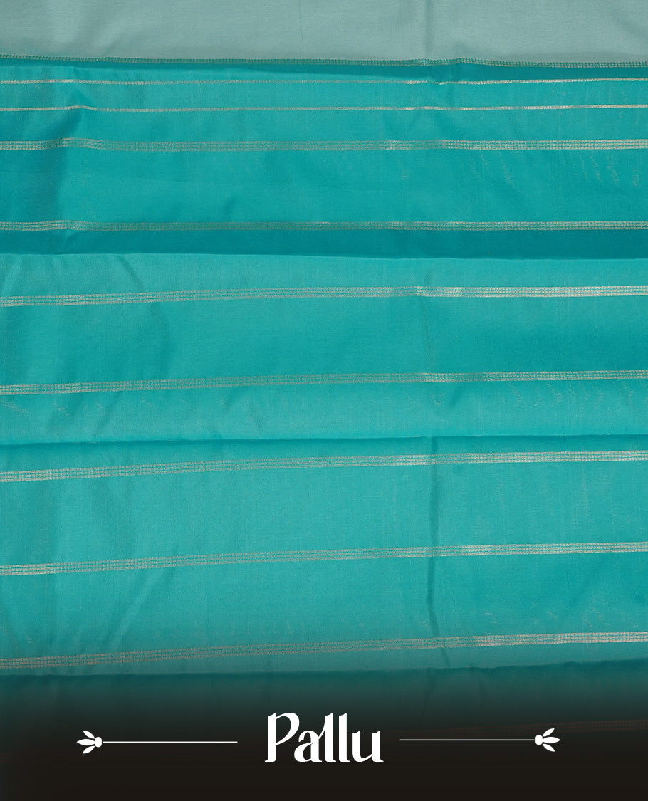 Off White  Colour Semi Silk Saree Featuring  Teal thread buttas On Body, Highlighted  by contrast border with Mango motifs, paired with matching blouse piece.