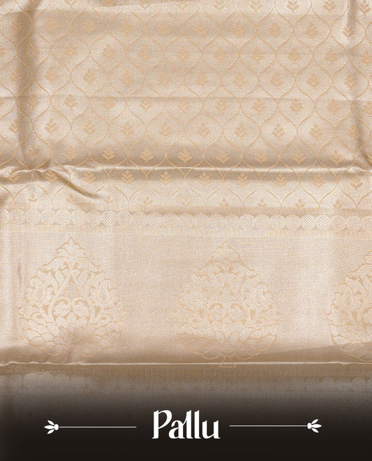 Golden Cream colour Semi Tissue silk saree featuring Gold zari kodi pattern on body, complemented by traditional border with self colour, paired with matching blouse piece.