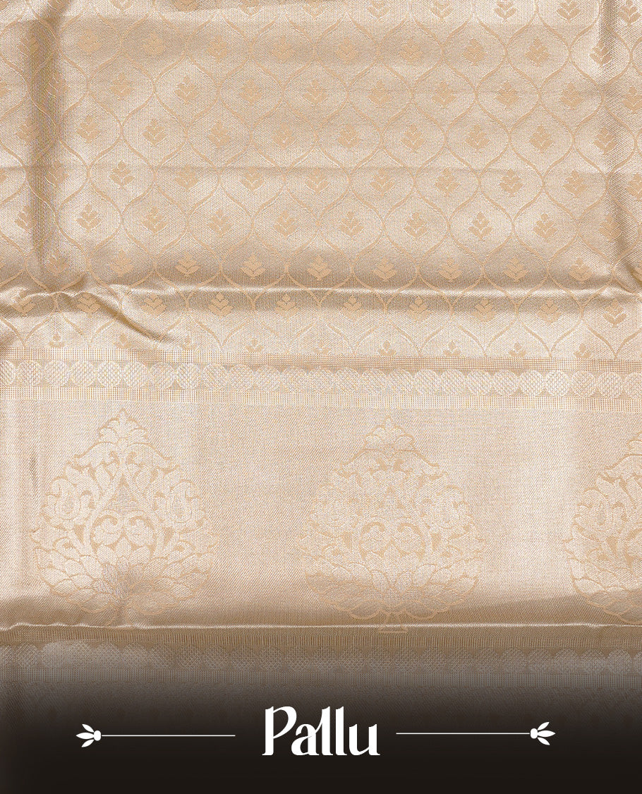 Golden Cream colour Semi Tissue silk saree featuring Gold zari kodi pattern on body, complemented by traditional border with self colour, paired with matching blouse piece.