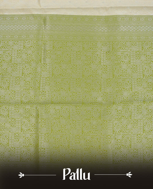Pastel yellow colour semi silk saree featuring Silver zari pattern on body, complemented by contrast Green colour with silver zari border, comes with matching blouse piece.