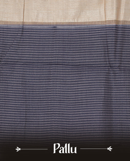 Light gold Colour Tussar saree featuring elegant plain body, complemented by contrast Navyblue colour with zari work border, comes with matching blouse piece.