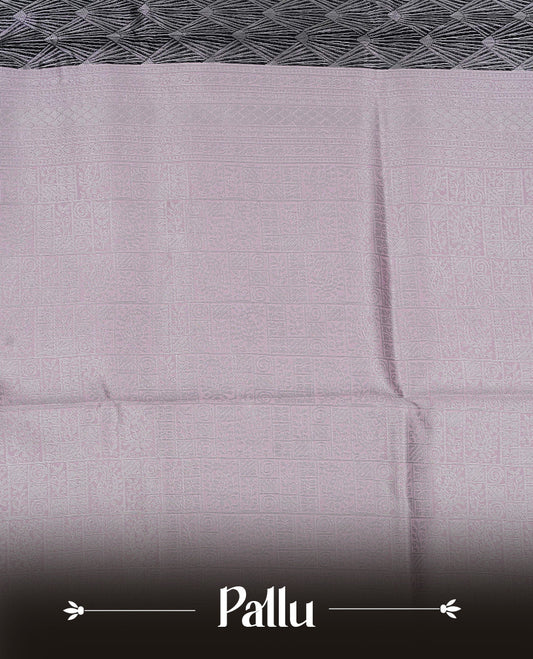 Black colour semi silk saree featuring Silver zari Design pattern on body, complemented by contrast Pink colour with silver zari border, comes with matching blouse piece.