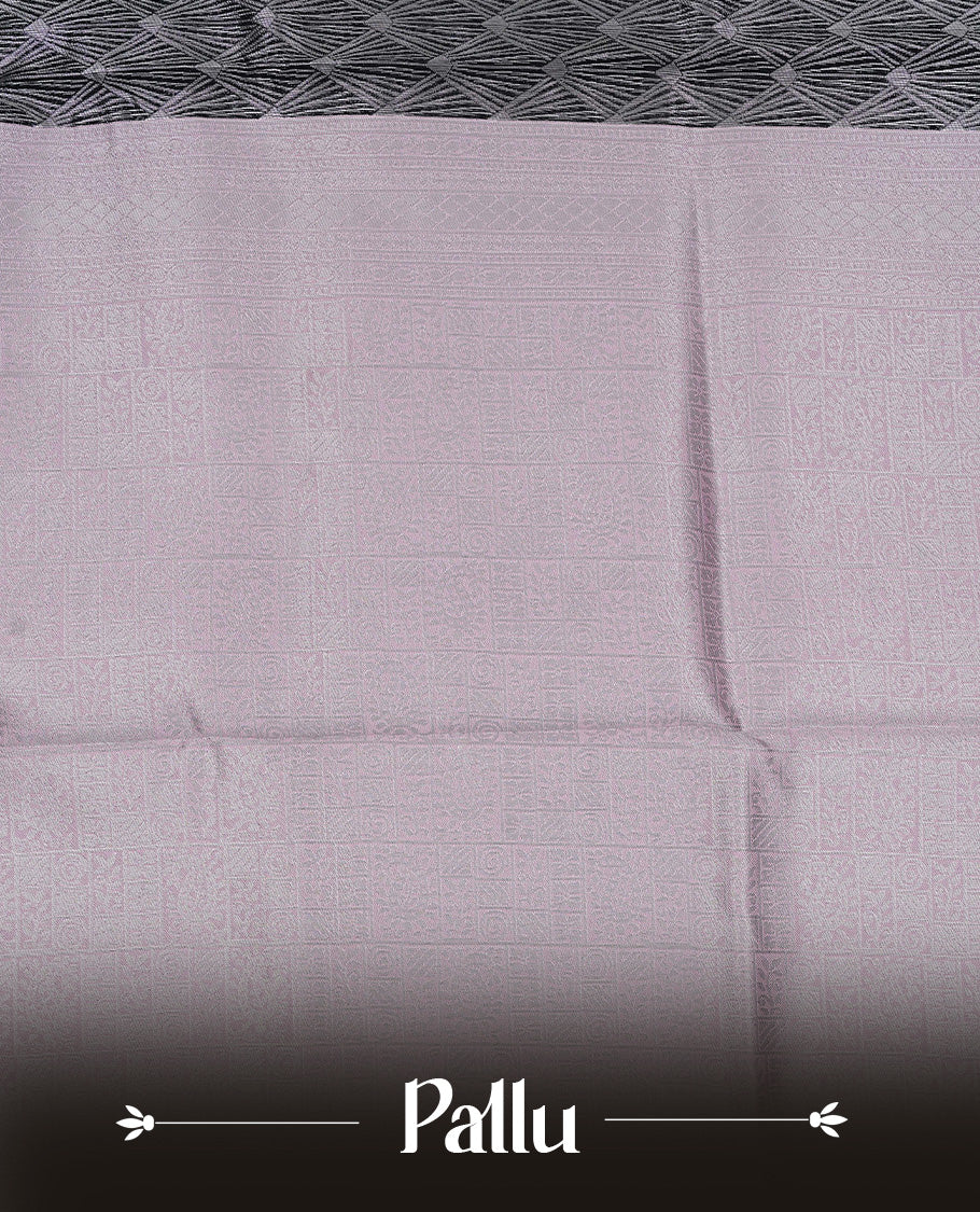 Black colour semi silk saree featuring Silver zari Design pattern on body, complemented by contrast Pink colour with silver zari border, comes with matching blouse piece.