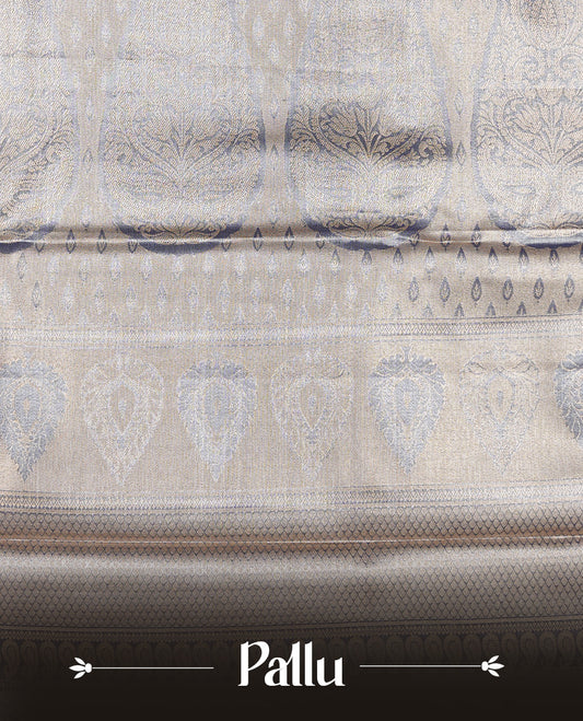 Pink colour tissue silk saree featuring Gold, Blue & silver zari kodi pattern on body, complemented by contrast violet colour with traditional border, paired with matching blouse piece.