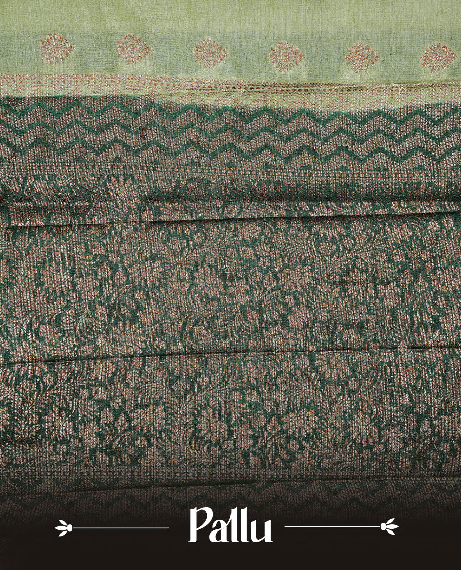 Pastel Green Colour Tussar silk saree featuring Antique Zari motifs on body, Finished with contrast Green colour Zigzag zari pattern border, paired with matching blouse piece.