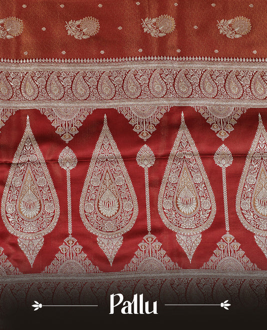 Red colour Mulberry silk saree featuring Gold zari small buttas & floral motifs  on body, complemented by self colour with Gold zari border, comes with matching blouse piece.