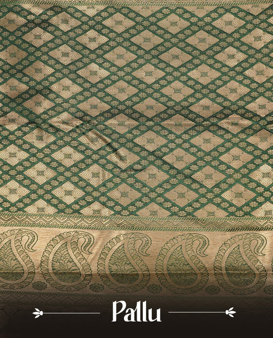 Bottle green Semi Wedding Silk Saree featuring Gold Zari zigzag pattern On body, Complemented with traditional zari with Self colour border, paired with matching blouse piece.