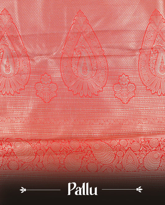 Red colour semi wedding silk saree featuring Gold zari pattern on body, complemented Silver Elephant motifs & gold zari border, paired with matching blouse piece.