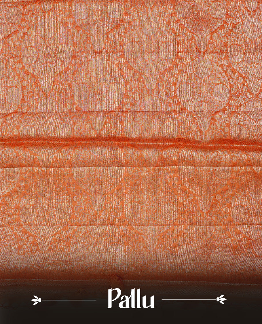 Burnt Orange  colour pure tussar silk saree featuring Light gold zari floral kodi work on the body, a plain border, grand pallu, Paired With  a matching blouse piece.