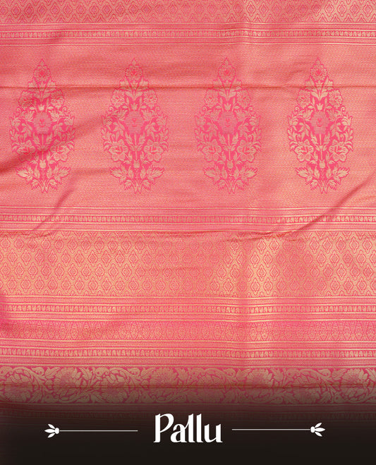 Black colour semi wedding saree featuring gold zari floral kode pattern on body, complemented by contrast magenta with traditional border, paired with matching blouse piece.
