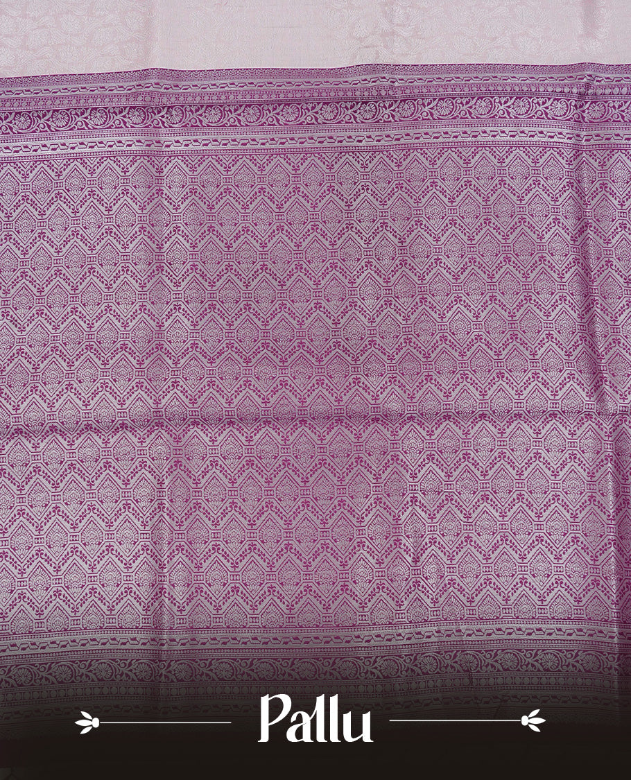 Baby pink colour semi silk saree featuring Silver zari Floral kodi pattern on body, complemented by contrast purple colour with silver zari border, comes with matching blouse piece.