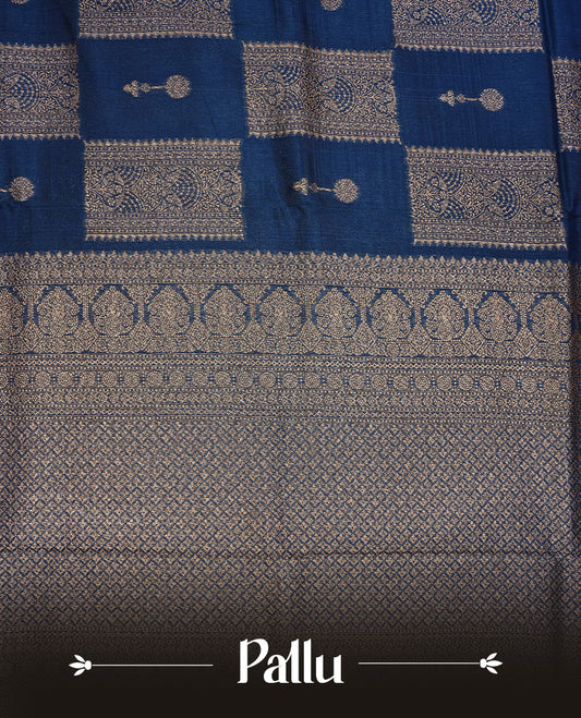 Teal colour Tussar Banaras Georgette silk saree featuring Antique zari Box Pattern on body, complemented by self colour border with zari border, paired with matching blouse piece.