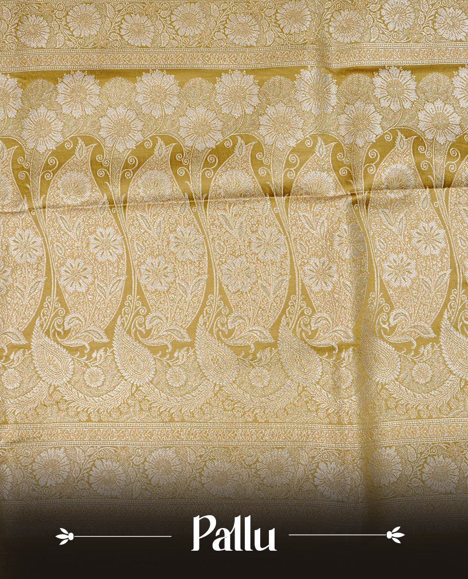 Olive colour Mulberry silk saree featuring gold zari motifs on body, complemented by contrast self colour with gold zari border, comes with matching blouse piece.