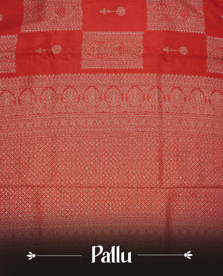 Red colour Tussar Banaras Georgette silk saree featuring Antique zari Box Pattern on body, complemented by self colour border with zari border, paired with matching blouse piece.