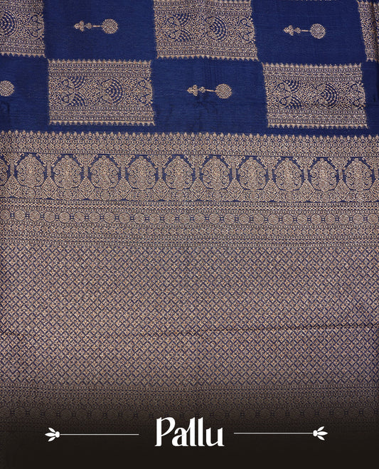 Navy Blue colour Tussar Banaras Georgette silk saree featuring Antique zari Box Pattern on body, complemented by self colour border with zari border, paired with matching blouse piece.