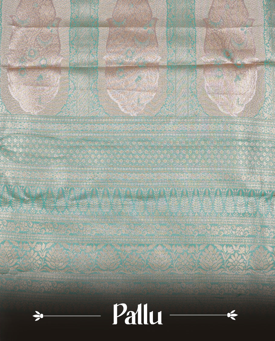 Light Pink colour Tissue silk saree featuring Green colour floral zari motifs on body, complemented by contrast Light green zari border, paired with matching blouse piece.