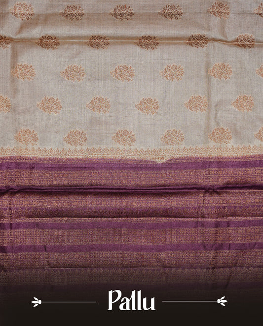 Golden Cream Colour Banaras tussar silk saree featuring Antique zari Motifs on body, Complemented by Burgundy colour variant with zari border, paired with matching blouse Piece.