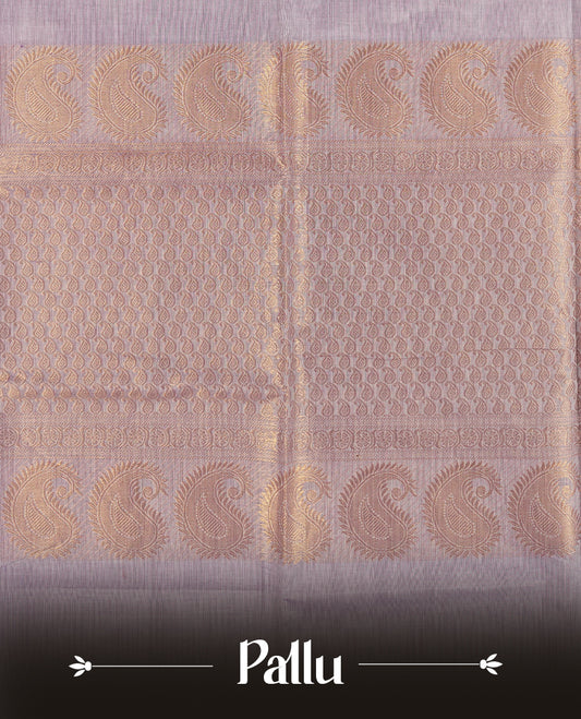 Lavender colour Chettinad cotton saree featuring subtle small motifs on the body, The saree is highlighted with a rich purple zari woven border adorned with floral and geometric patterns & Comes with a matching blouse piece.