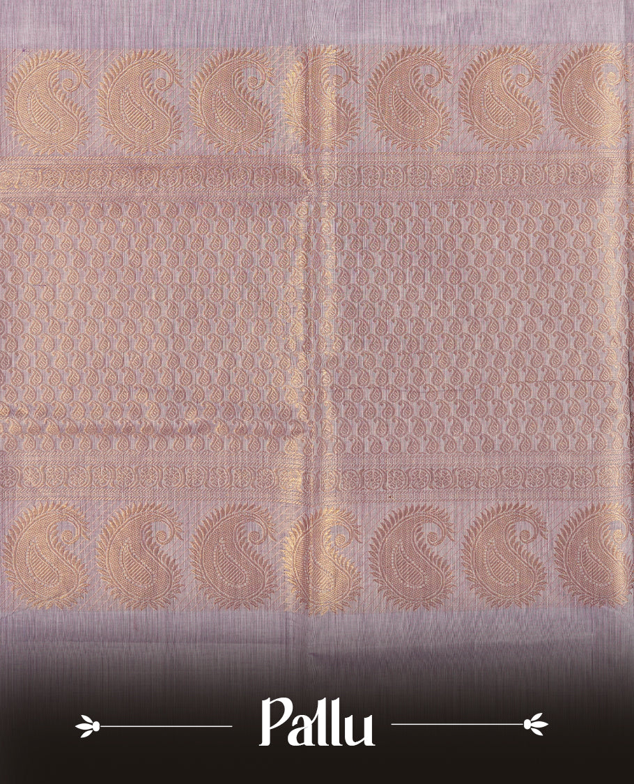 Lavender colour Chettinad cotton saree featuring subtle small motifs on the body, The saree is highlighted with a rich purple zari woven border adorned with floral and geometric patterns & Comes with a matching blouse piece.