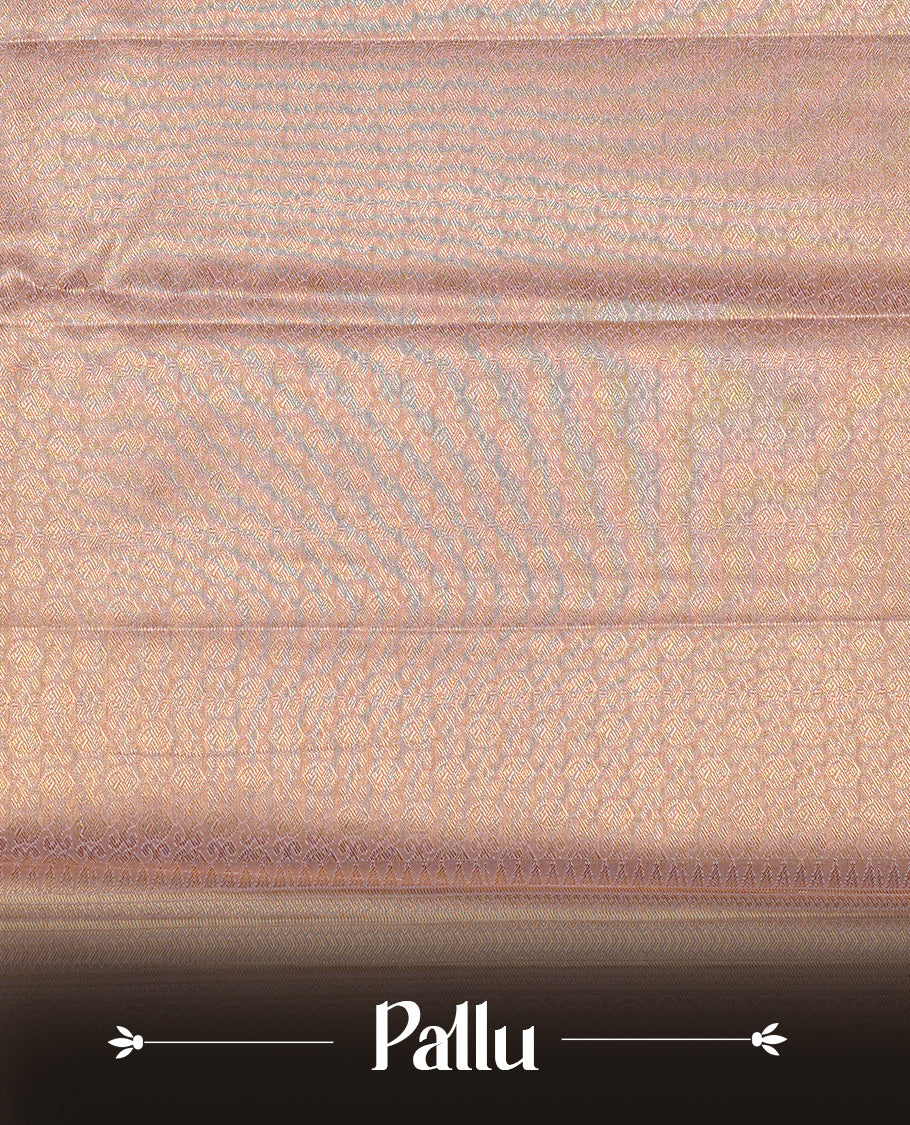 Peachy gold colour tissue silk saree featuring Self colour zari floral pattern on body, enhanced with traditional border on self colour , paired with Matching blouse piece.