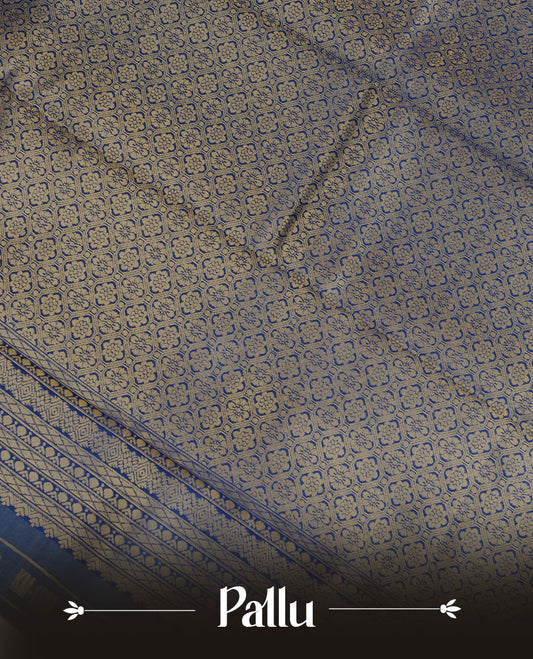 Cream Colour Semi Soft Silk Saree Featuring Gold zari Check With motifs Pattern On Body, Highlighted  by contrast Blue border with Gold zari, paired with matching blouse piece.
