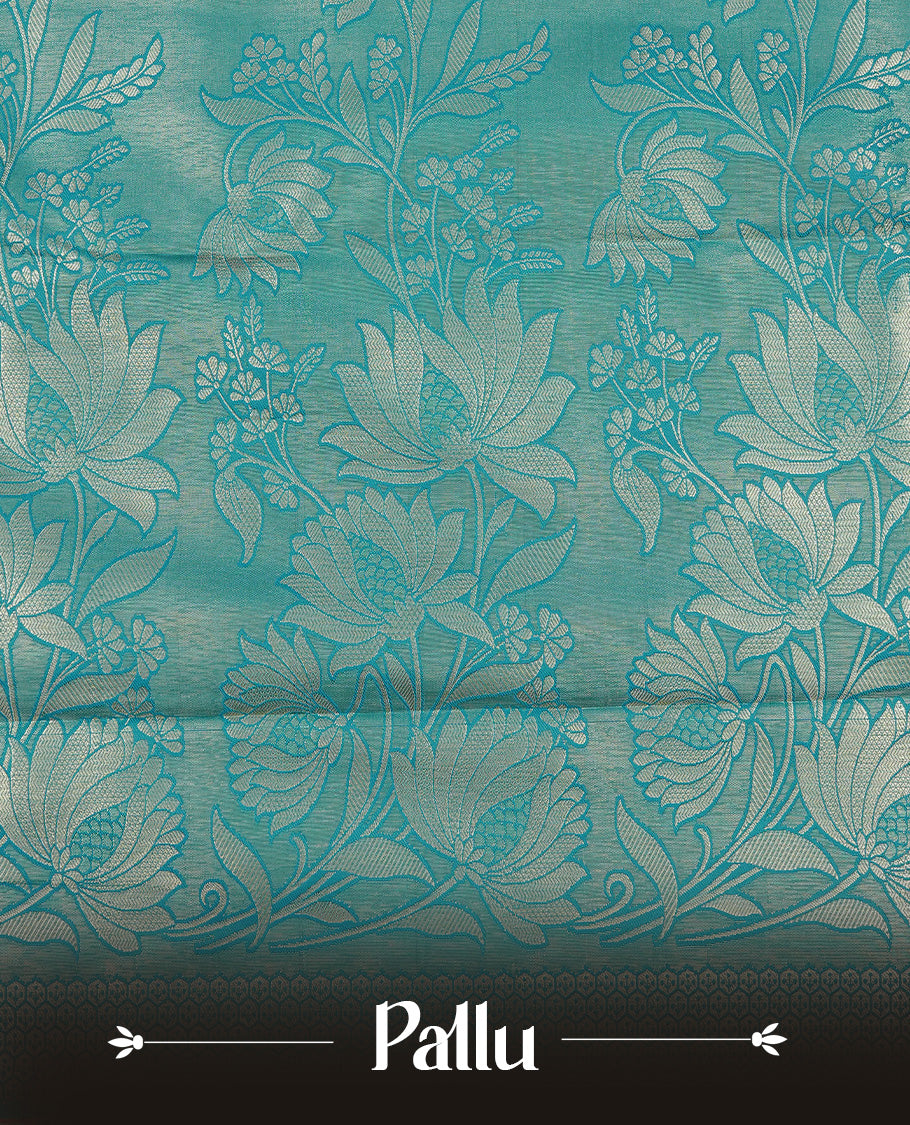 Green colour semi wedding silk saree featuring Gold zari floral kodi pattern on body, complemented by Traditional zari on self colour with Maroon piping, paired with matching blouse piece.