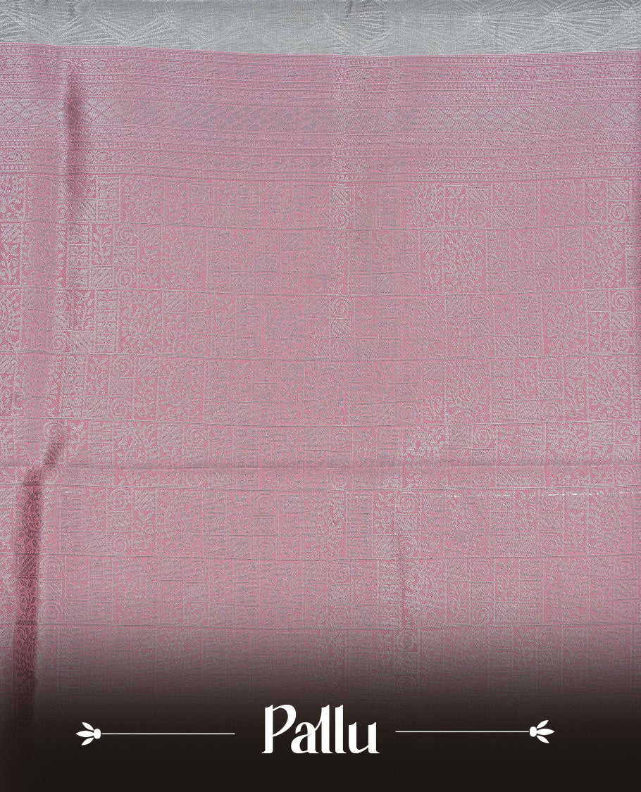 Grey colour semi silk saree featuring Silver zari Design pattern on body, complemented by contrast Pink colour with silver zari border, comes with matching blouse piece
