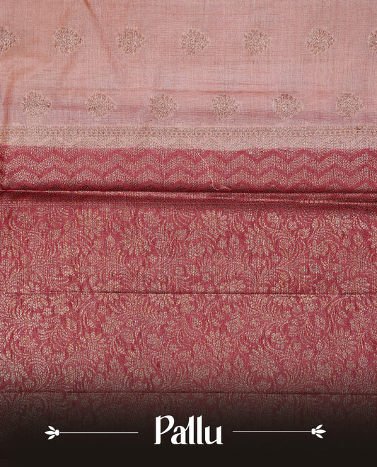 Peach Colour Tussar silk saree featuring Antique Zari motifs on body, Finished with contrast Maroon colour Zigzag zari pattern border, paired with matching blouse piece.