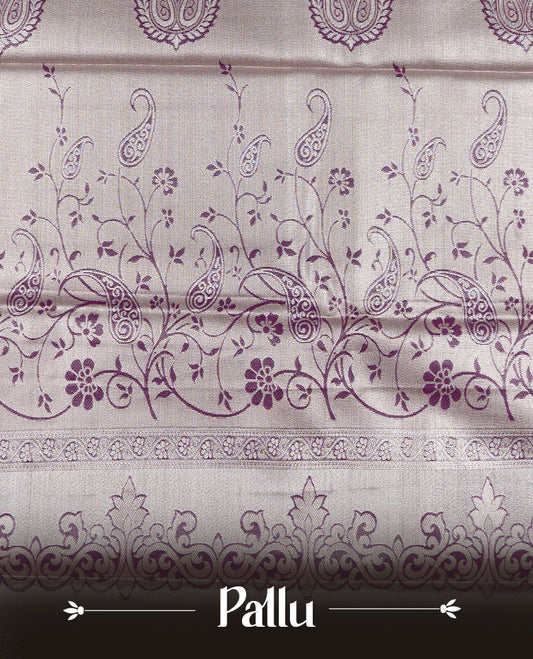 Light green colour tissue saree featuring silver & gold zari floral kodi pattern on the body, highlighted by a contrast Burgundy colour border with gold traditional zari, paired with a matching blouse piece.