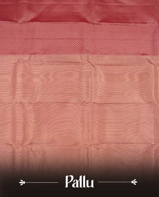 Dark mauve colour Vasundhara silk saree adorned with all-over tiny motifs on the body, complemented by a self colour with tiny diamond pattern with gold tree motifs on border and paired with a matching blouse piece.