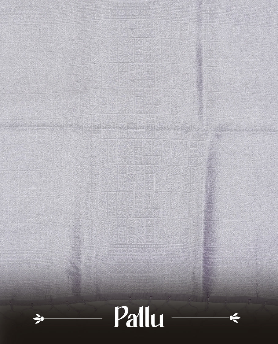 Pink colour semi silk saree featuring Silver zari Design pattern on body, complemented by contrast Lavender colour with silver zari border, comes with matching blouse piece.