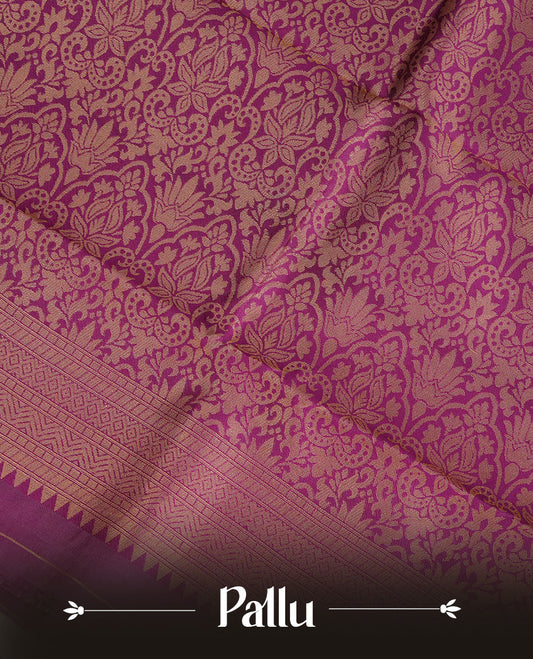 Cream Colour Semi Soft Silk Saree Featuring Gold zari Patter On Body, Highlighted  by contrast Purple border with Gold zari, paired with matching blouse piece.