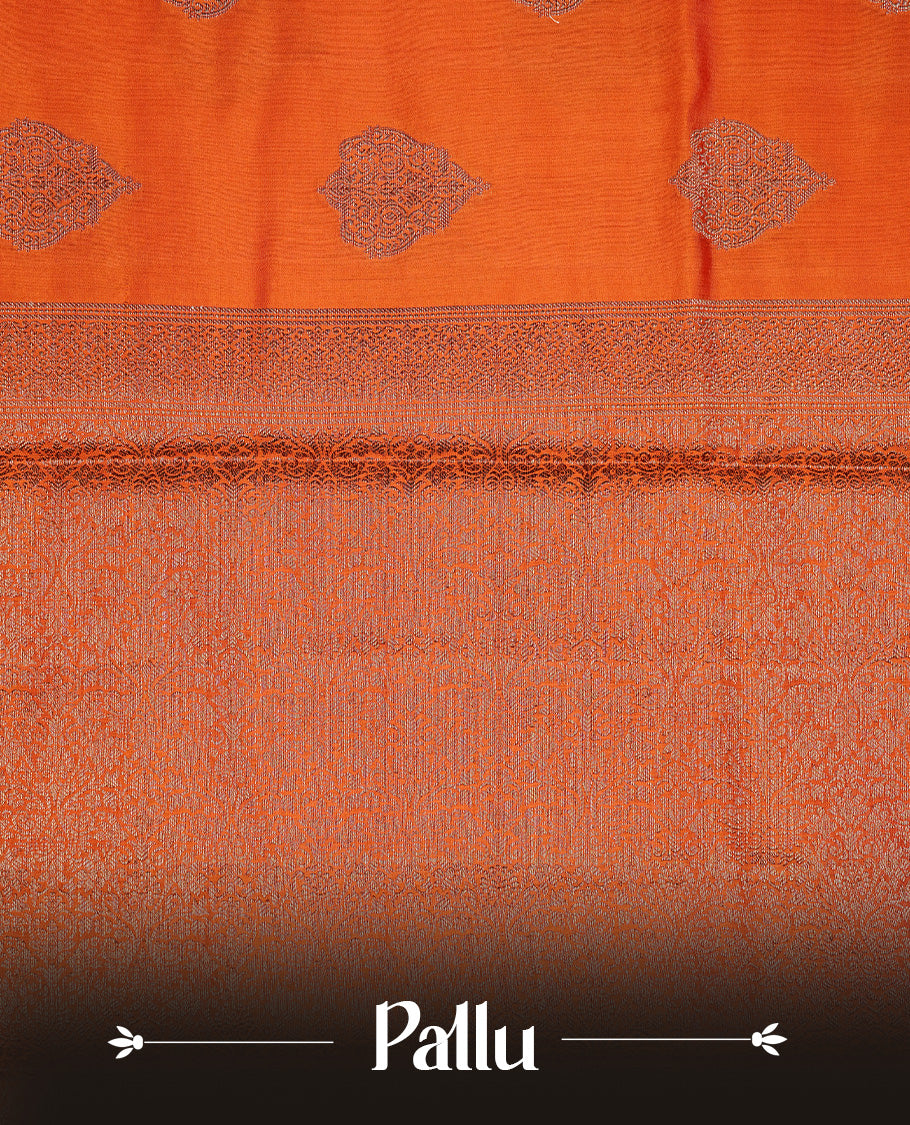 Orange Colour Pure Banaras Soft Silk saree featuring Antique Zari buttas in body, complemented by zari work on self colour border, paired with matching Blouse Piece.