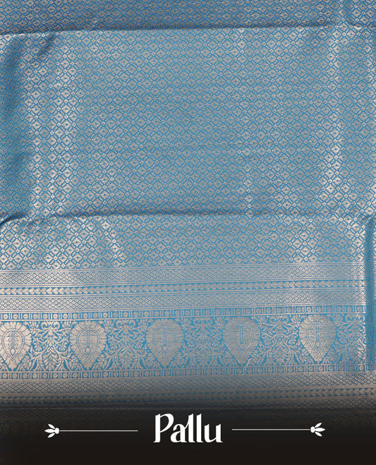 Aqua Colour Wedding Silk Saree Featuring Gold zari Strip pattern on body, complemented by traditional Zari pattern on self colour border, paired with matching blouse piece.