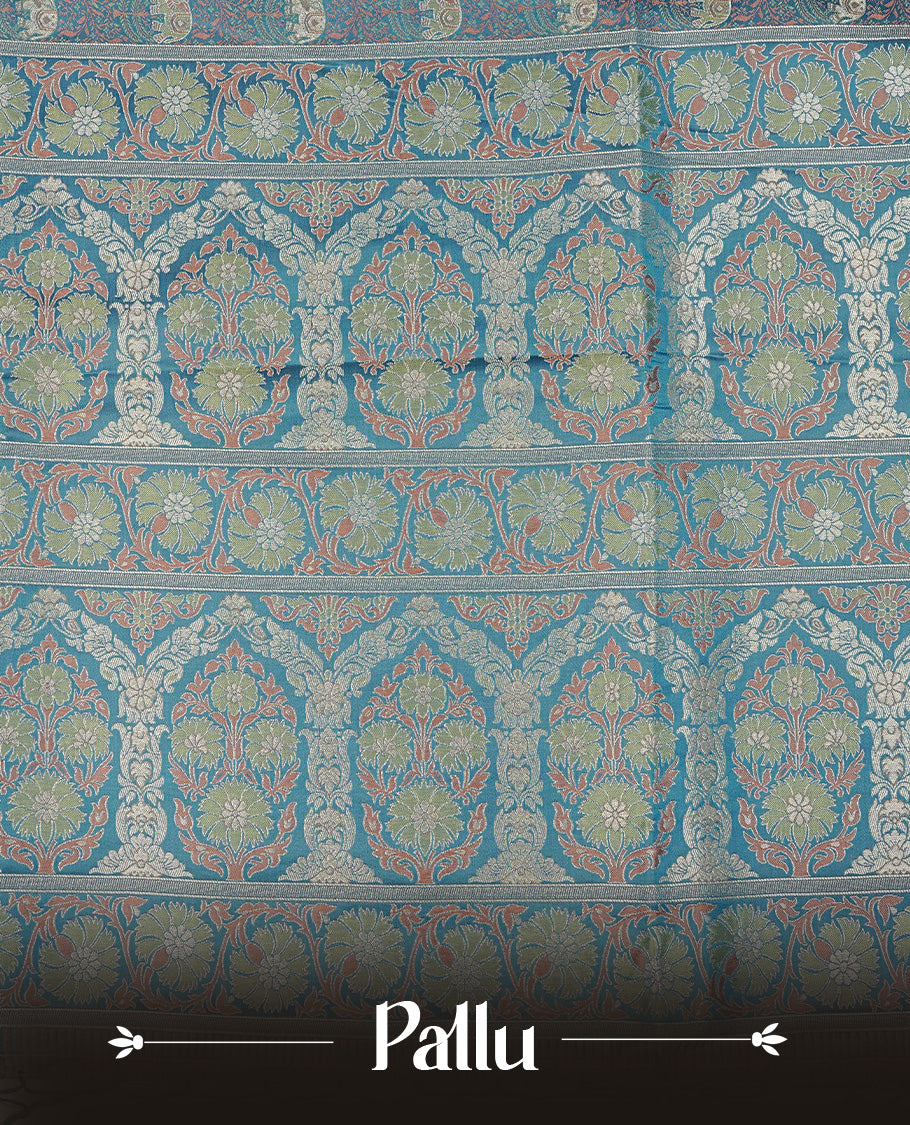Teal colour Mulberry silk saree featuring gold zari elephant & floral kodi pattern across body, complemented by self colour border with gold zari work, comes with matching blouse piece.