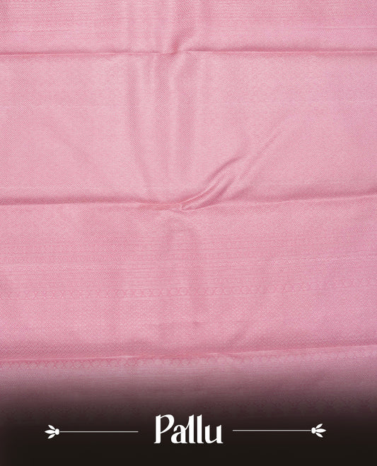 Baby pink colour pure wedding silk saree featuring Light gold zari Floral kodi pattern on body, complemented by self colour with traditional border, comes with matching blouse piece.