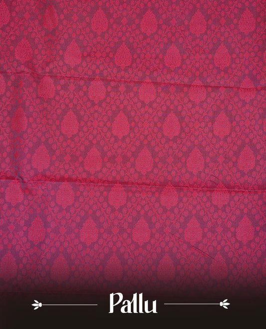 Reddish pink colour Semi silk saree Featuring Self zari Pattern on body, complemented by Maroon colour with gold zari border, paired with matching blouse piece.