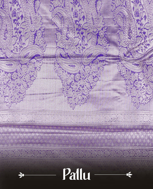 Light purple colour tissue saree featuring rose gold zari floral kodi pattern on the body, highlighted by a self colour border with rose gold traditional zari, paired with a matching blouse piece.