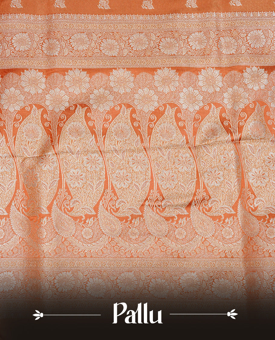 Orange colour Mulberry silk saree featuring gold zari motifs on body, complemented by contrast self colour with gold zari border, comes with matching blouse piece.