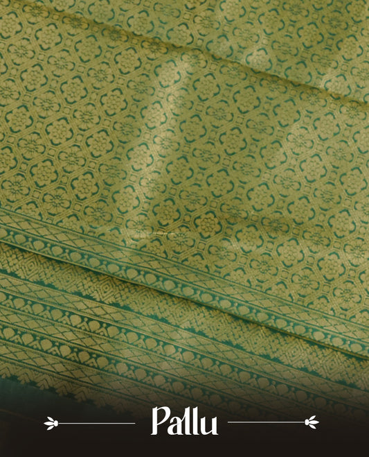 Cream Colour Semi Soft Silk Saree Featuring Gold zari Check With motifs Pattern On Body, Highlighted  by contrast Green border with Gold zari, paired with matching blouse piece.