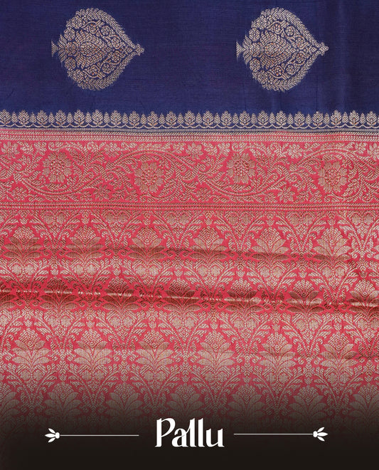 Navy blue colour banaras silk saree featuring gold zari motifs on body, complemented by contrast red colour with traditional border, comes with matching blouse piece.