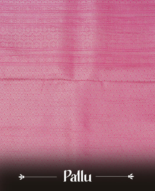 Magenta colour softie silk saree featuring silvar zari, rich pallu floral pattern brocade body, with contrasting self colour patterned border.paired with matching blouse piece.